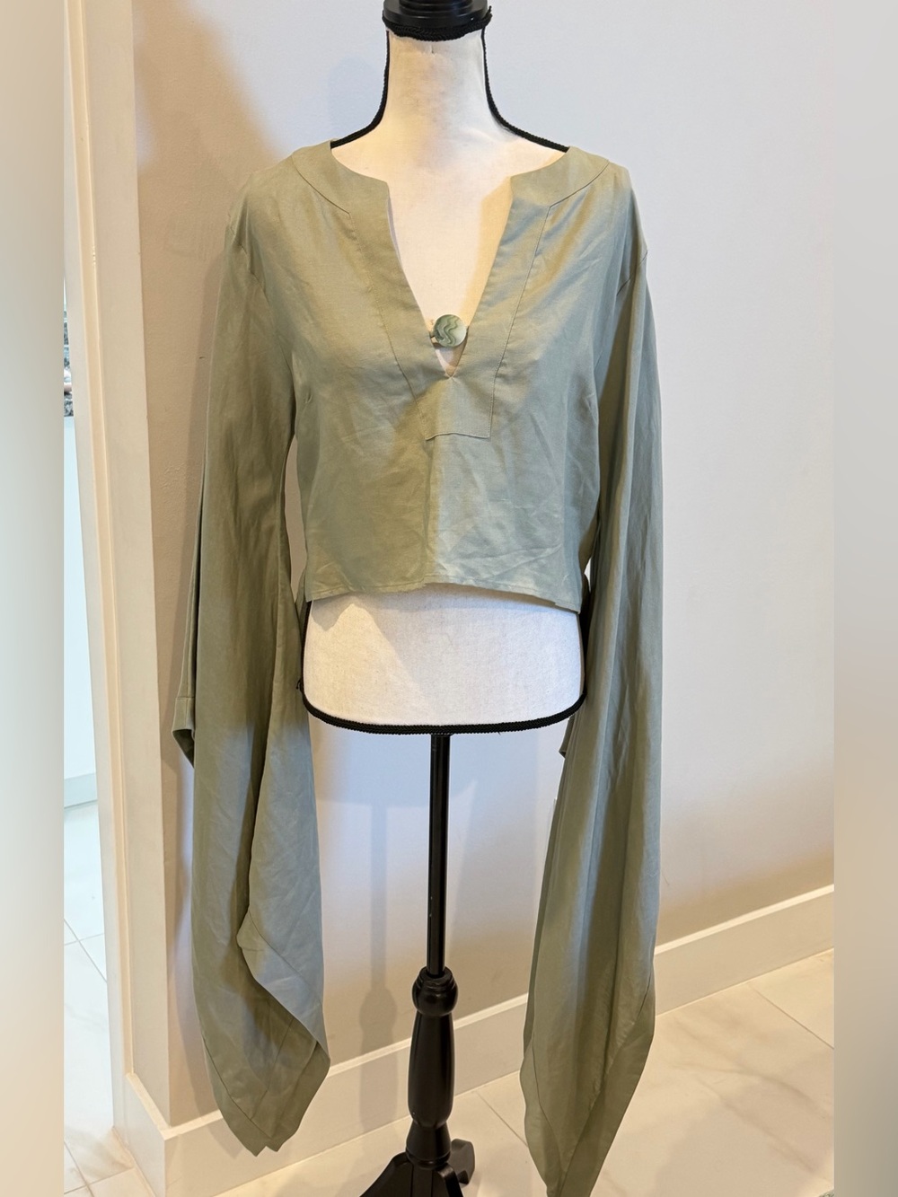 cult gaia sage green draped sleeve crop top